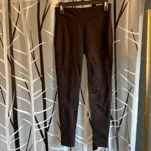 Black leggings with mesh criss cross.